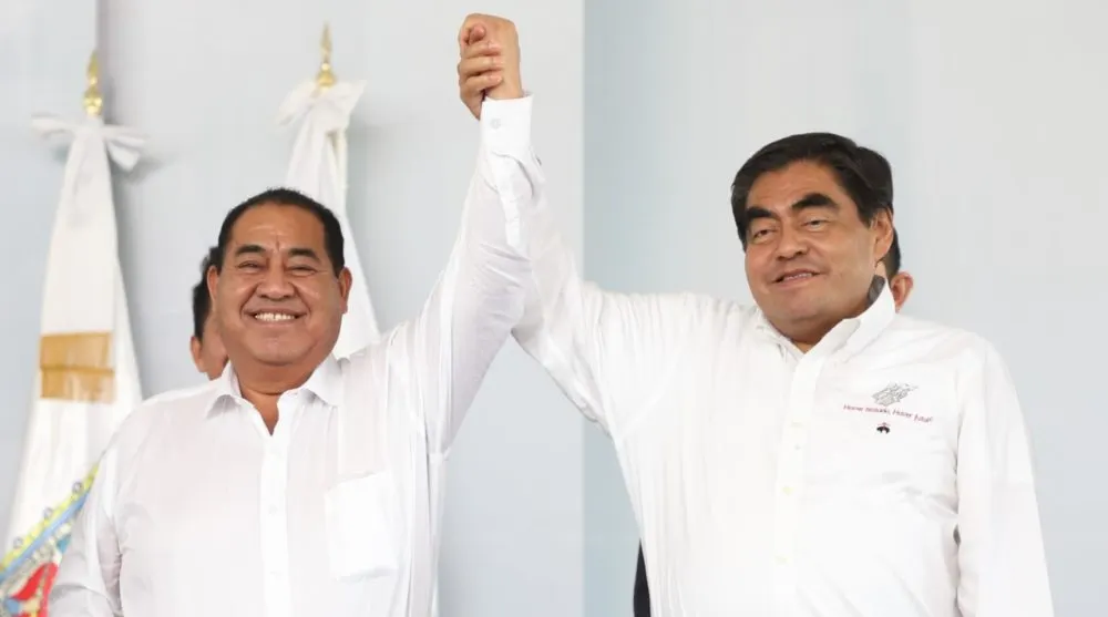Miguel Barbosa y Mario de la Rosa Romero