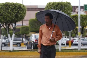 Canales de baja presión ocasionarán más lluvias en Puebla