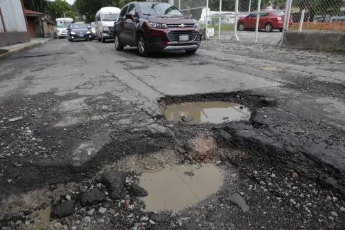 Lluvias ocasionan incremento de baches hasta en un 50%; ya preparan un programa integral: Aysa
