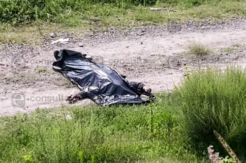 Hallan en Cuautlancingo cuerpos degollados junto al Periférico