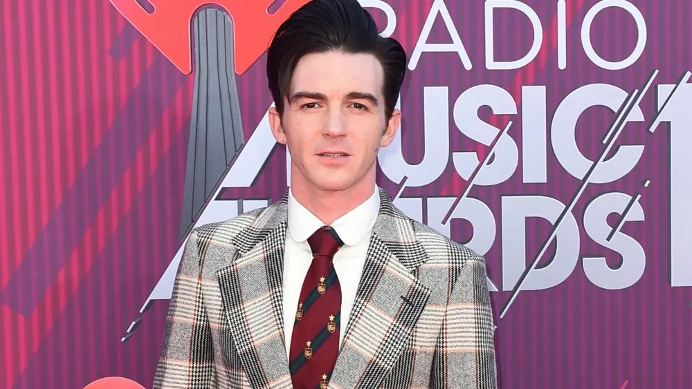 FILE – Drake Bell arrives at the iHeartRadio Music Awards on March 14, 2019, in Los Angeles. Bell, the former star of the popular Nickelodeon show “Drake &amp; Josh,” pleaded guilty on Wednesday, June 23, 2021, to charges relating to a girl who met him online and attended one of his concerts in Cleveland in 2017, when she was 15. (Photo by Jordan Strauss/Invision/AP, File)