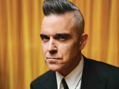 Robbie Williams vuelve a insultar a Liam Gallagher y continúa pelea