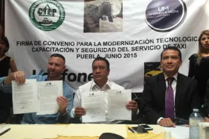 Taxistas firman convenio de modernización tecnológica con Umbrella