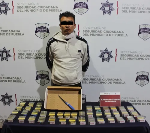 Detuvo policía municipal de Puebla a presunto multiasaltante de tiendas Oxxo