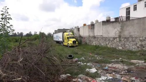 Suman al menos 300 los cadáveres contenidos en tráilers en Jalisco