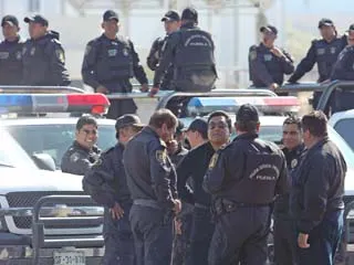Suspenden a comandante de Coronango por protestas de policías