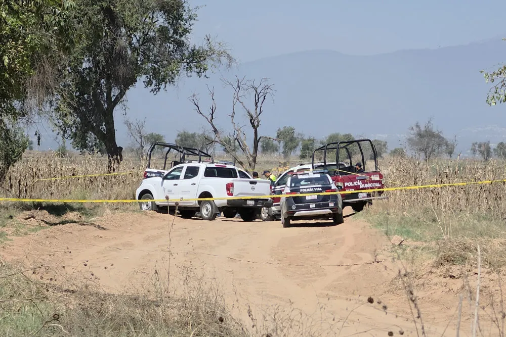 Hallan cuerpo embolsado en Coronango; estaba a 10 minutos de los decapitados en Xoxtla
