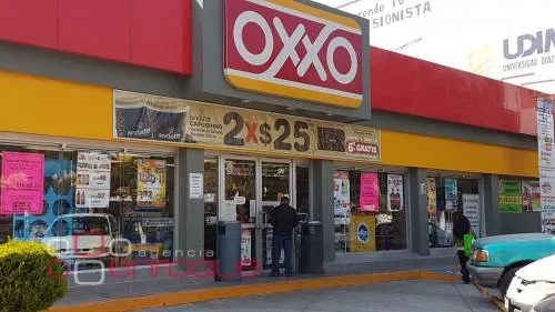¡Tiendas Oxxo en Puebla se blindan! Para prevenir saqueos, atenderán sólo por ventanillas