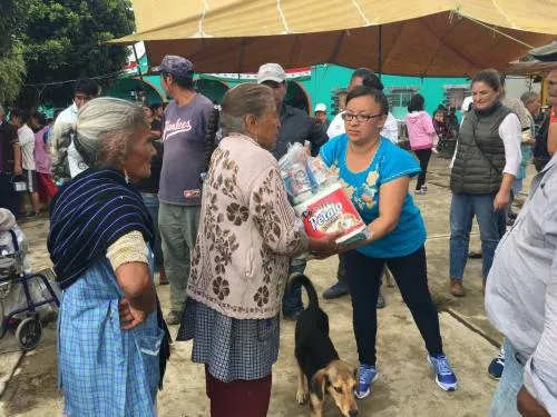 Migrantes envían tres toneladas de víveres a Tochimilco