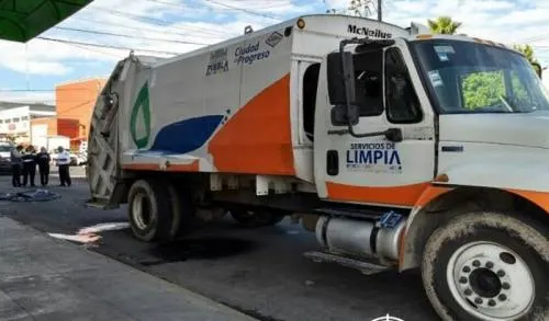 Hombre muere aplastado por camión de basura