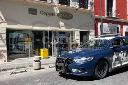 Asaltan Coppel Canadá del centro de Puebla; hampones se llevan celulares