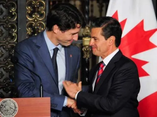 Peña Nieto y Trudeau acuerdan firmar T-MEC en cumbre del G-20