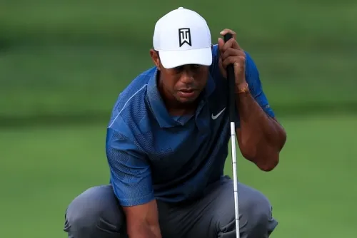 Tiger Woods se resiente de la espalda en difícil ronda de torneo Memorial
