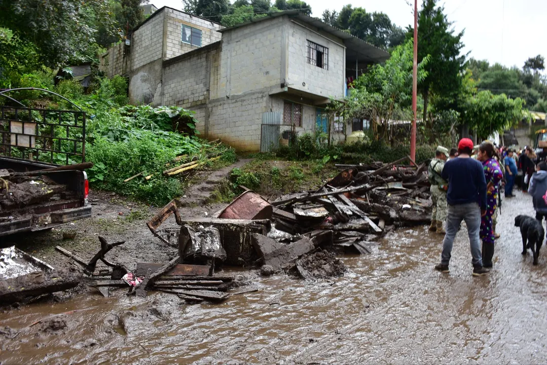 Sube a 13 el número de muertos por lluvias en Puebla; cuatro personas siguen desaparecidas