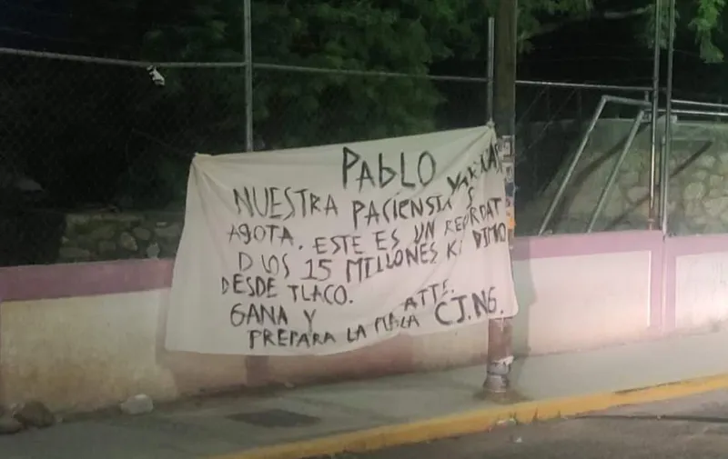 Aparecen mantas de amenazas contra candidato de Coxcatlán