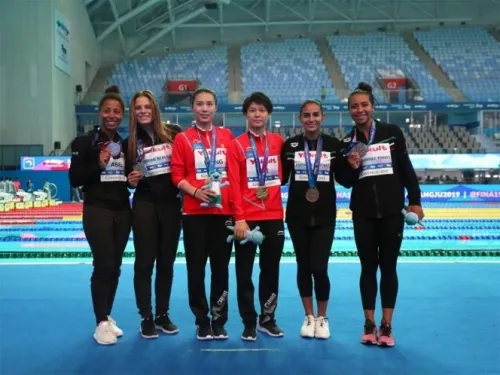 Espinosa y Hernández ganan bronce en Mundial de Natación