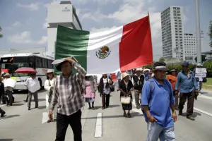 Marchan auxiliares para regreso del Registro Civil a comunidades