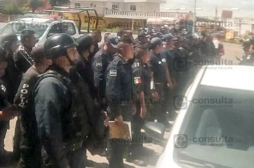 Retienen a policías en Ocoyucan y alistan operativo de rescate