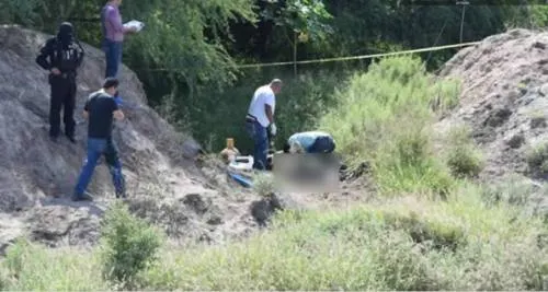 Encuentran cuerpo de mujer en estado de descomposición en la federal Atlixco-Izúcar
