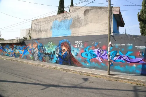 COVID-19 inspiró al Colectivo 173 para realizar un mural sobre el virus