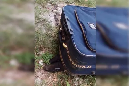 Hallan cuerpo desmembrado en una maleta y con un narcomensaje, en Atlixco