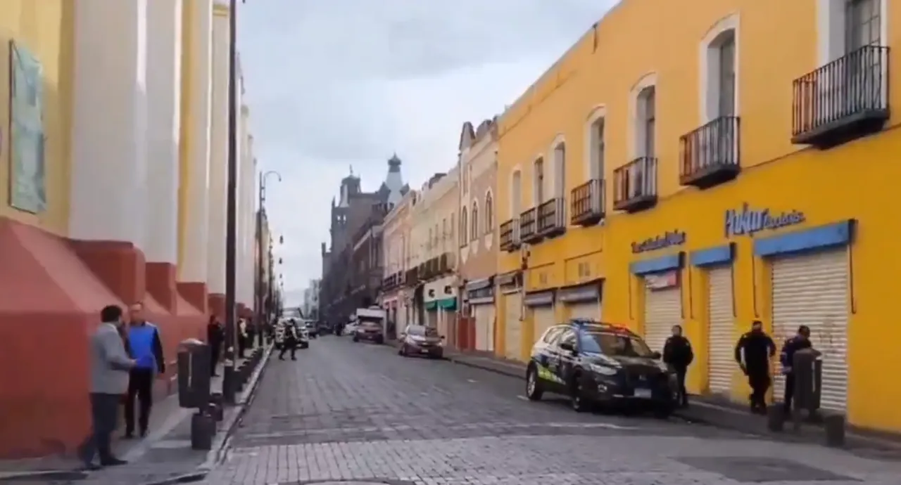 Intento de robo a zapatería Pakar en CH de Puebla