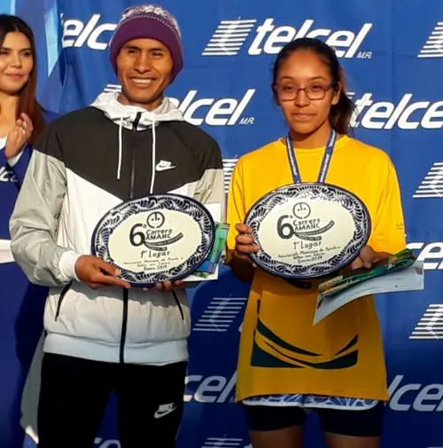 Luis Huerta y Kimberly Grande, ganadores de la Sexta Carrera Amanc 7 k.