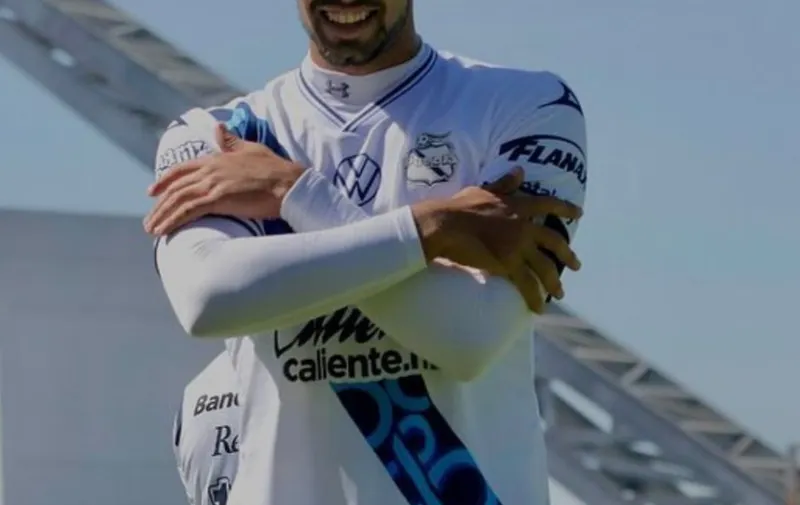 Foto: Pedro Budib Peniche con el equipo de Puebla