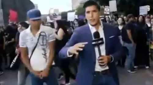 Reportan detención de sujeto que golpeó a reportero durante marcha