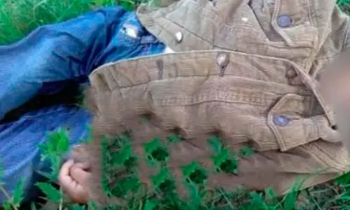 Hallan cuerpo de niño con huellas de estrangulamiento en terreno de la Amozoc-Nautla