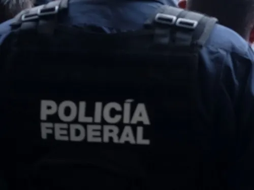 Caen 6 policías federales acusados de masacre en Michoacán