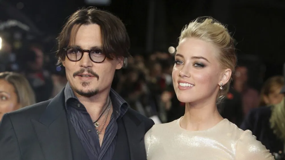 Amber Heard afirma que divorciarse de Depp fue muy duro porque lo “amaba demasiado”