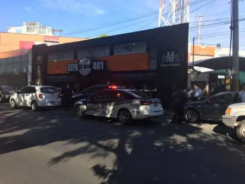 Se arma balacera en asalto a cuentahabiente a un costado de Plaza Dorada