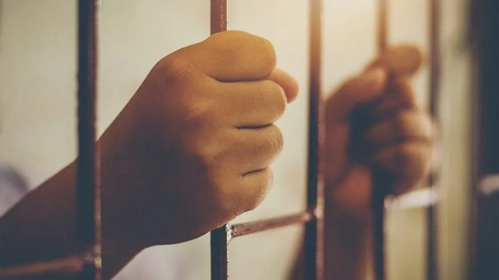 Cadena perpetua para tres hombres blancos por matar a joven afroamericano en EU