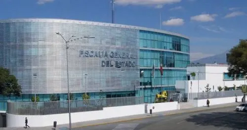FGE obtuvo la vinculación a proceso de dos policías de Libres acusados de evasión de presos