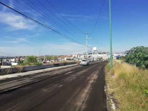 Se cambia asfalto y se construyen rampas temporales en el Periférico Ecológico