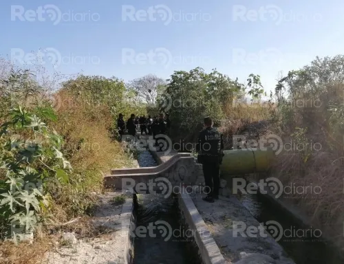Hallan a una adolescente flotando en canal de Tehuacán