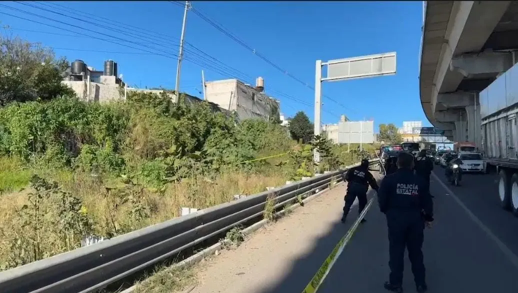 Encuentran cuerpo maniatado y embolsado cerca de la autopista México-Puebla