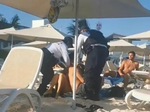 Investigan a ‘polis’ que esposaron a turistas en Playa Mamitas