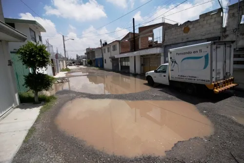Lluvias dejan al descubierto la ineficiencia del programa de bacheo de Rivera
