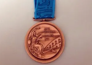 Medalla olímpica de Lance Armstrong permanece en bóveda