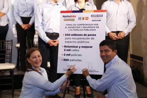Firman MEA y ERP compromisos: pavimentarán 3 mil calles y contratarán 2 mil nuevos policías
