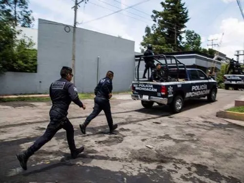 Cesan a mandos de SSP Michoacán por choque con normalistas