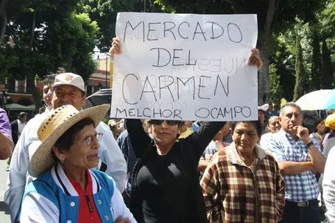 Protestan comerciantes y piden apertura de locales en El Carmen
