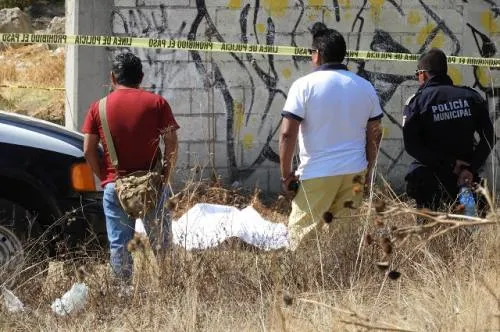 Encuentran cuerpo embolsado en Tecamachalco
