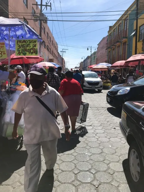Se registra riña entre ambulantes afuera del mercado 5 de Mayo