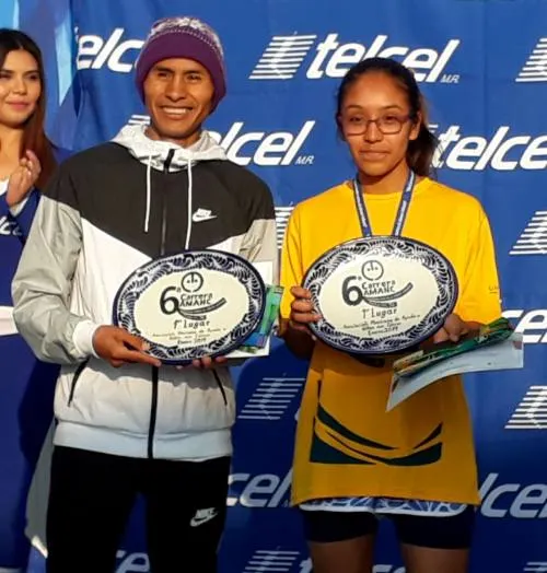 Luis Huerta y Kimberly Grande, ganadores de la Sexta Carrera Amanc 7 k.