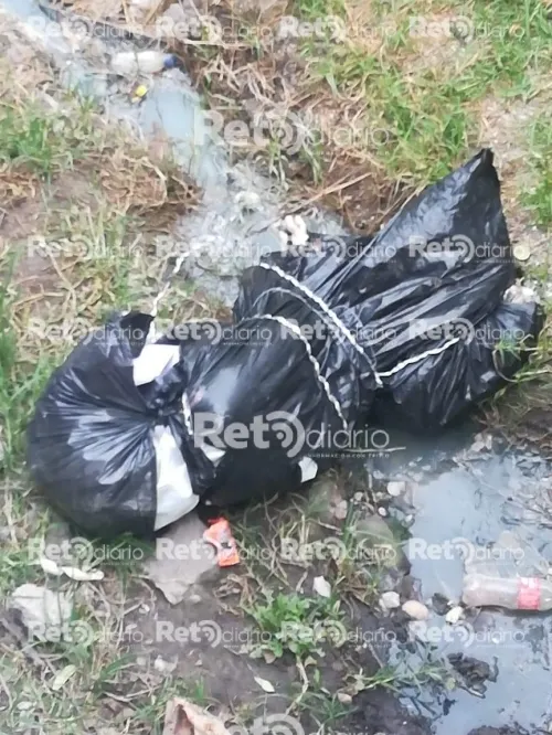 Dejan cadáver embolsado en Flor del Bosque