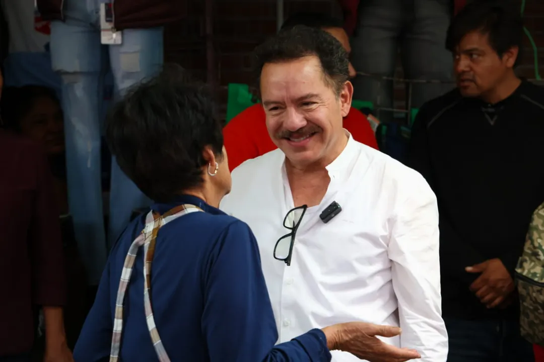 Locatarios del mercado de Atlixco van con Nacho Mier
