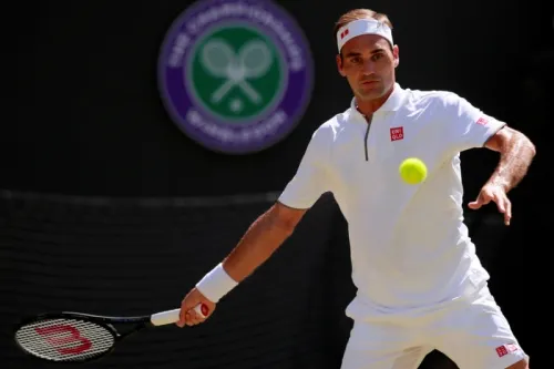 Federer se instala en tercera ronda de Wimbledon con triunfo ante británico Clarke